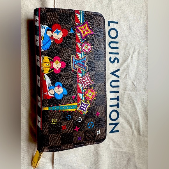 Louis Vuitton Handbags - Authentic LV Zippy wallet. Limited holiday edition.